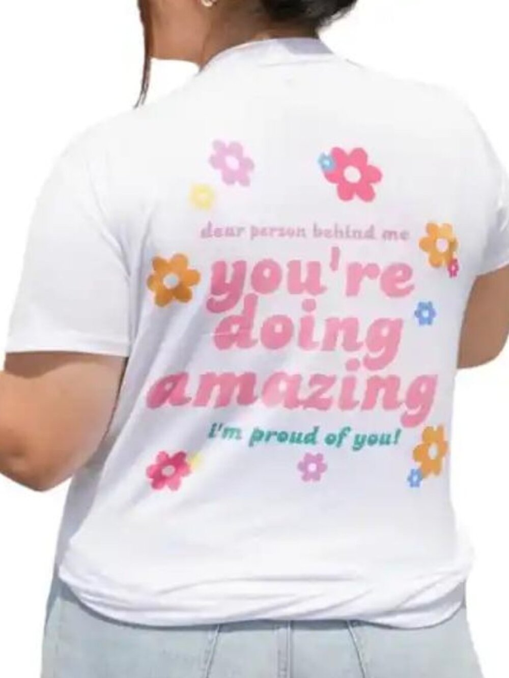 Pink & white baby tee with the words 'you're doing amazing'